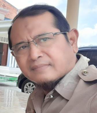 Kepala DP3AKB Pamekasan Munapik SAg MPd